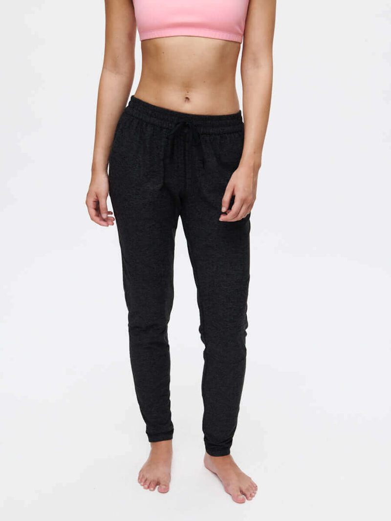 Model wearing CloudKnit Sweatpant with a mid-rise waist and side pockets, perfect for comfort and style.