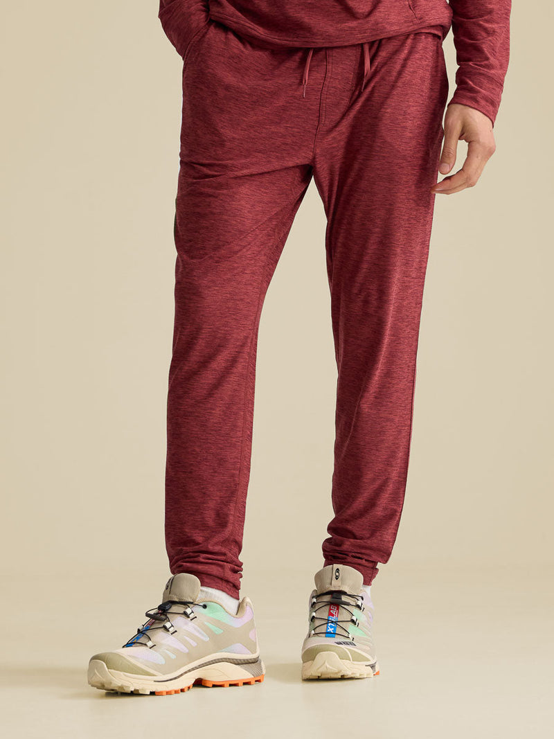 a person wearing burnt sumac sweatpants