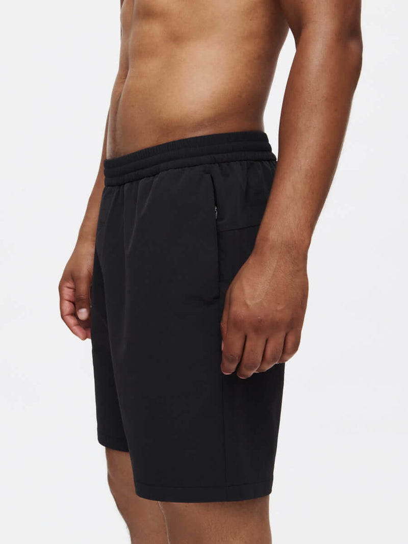 RecTrek 7" Short in black, perfect for recreation with zippered pockets and adjustable drawstring.