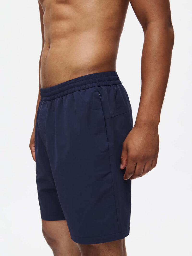 RecTrek 7" Short in navy, featuring adjustable drawstring and zippered pockets for ultimate comfort.