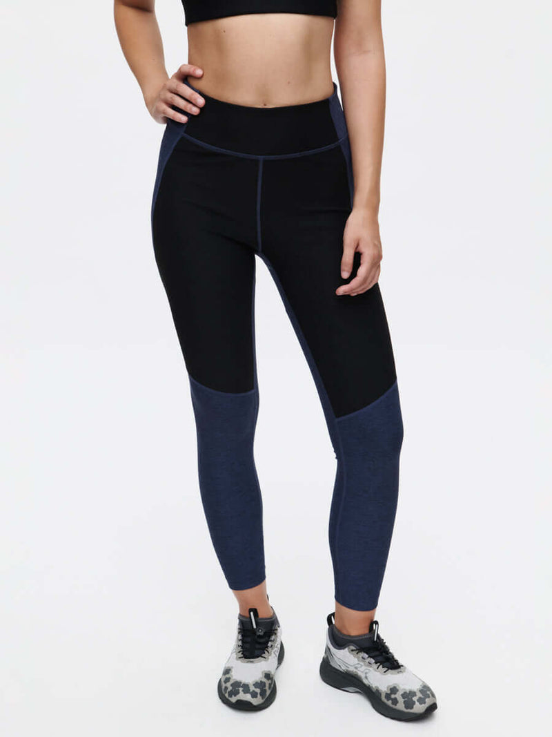 Two Tone 7/8 Legging showcasing stylish two-tone paneling for a perfect fit and sculpting effect.