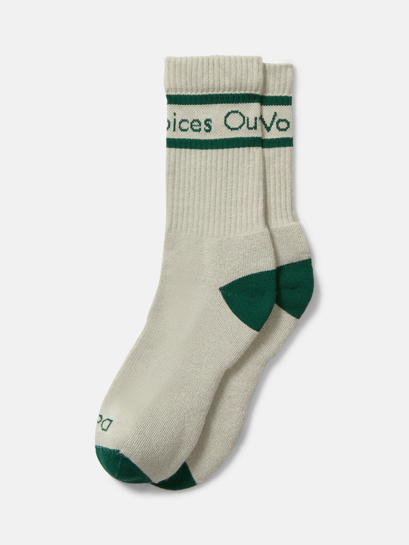 OV Club Crew Sock in cream color with green accents, featuring 'Doing Things' print for left and right identification.