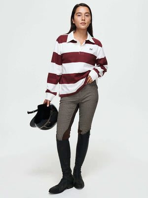 Stylish model wearing a Club Polo with ribbed cuffs, perfect for fall layering in elegant equestrian apparel.
