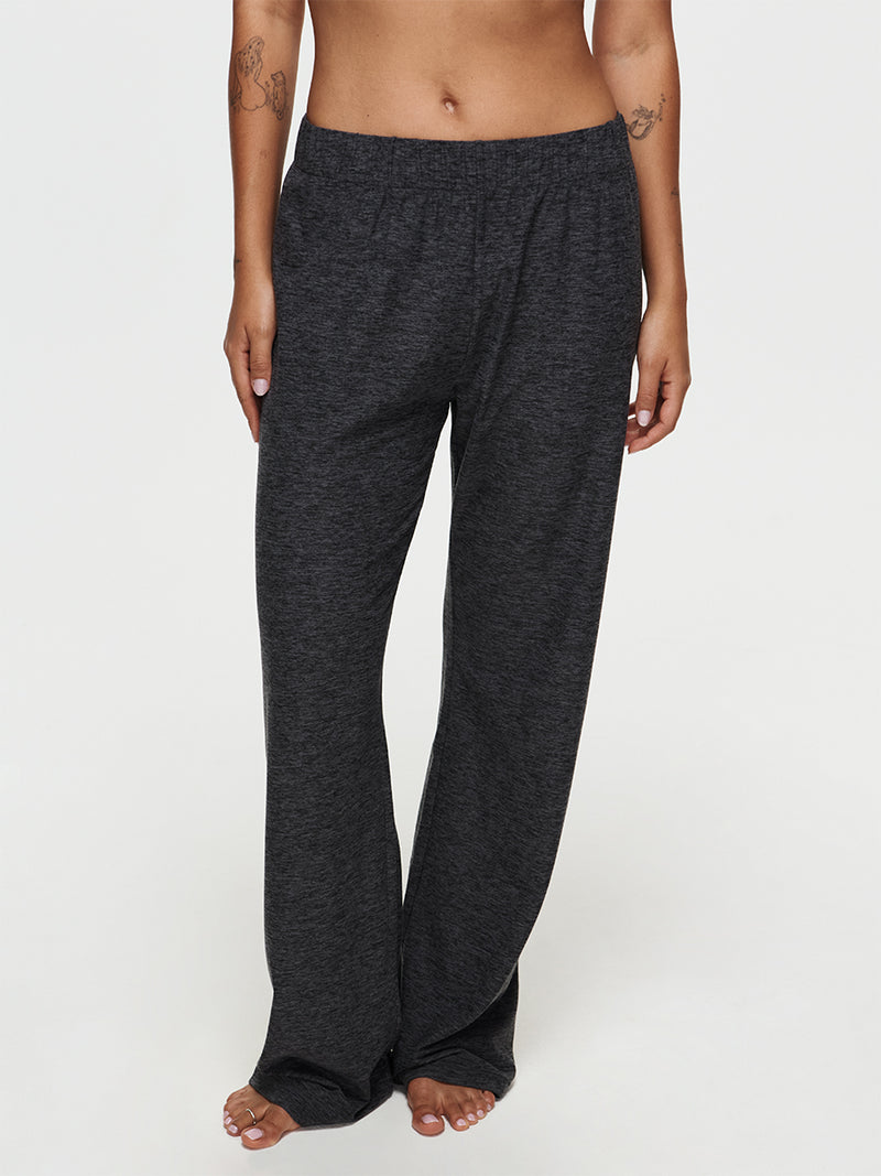 Model wearing CloudKnit Wide Leg Pant, a comfortable high-ride sweatpant in soft, breathable fabric.